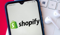 Kā pievienot domēna vārdu Shopify?